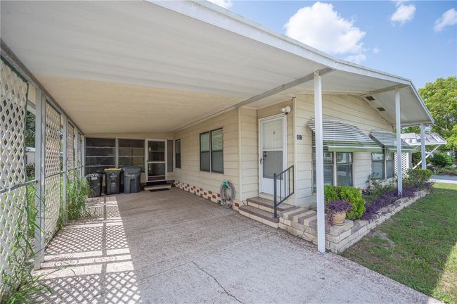 6027 Grand Oaks Dr Se, House other with 2 bedrooms, 2 bathrooms and null parking in WINTER HAVEN FL | Image 4