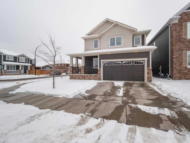 12 Yorkstone Heath Sw, Home with 4 bedrooms, 2 bathrooms and 4 parking in Calgary AB | Image 2