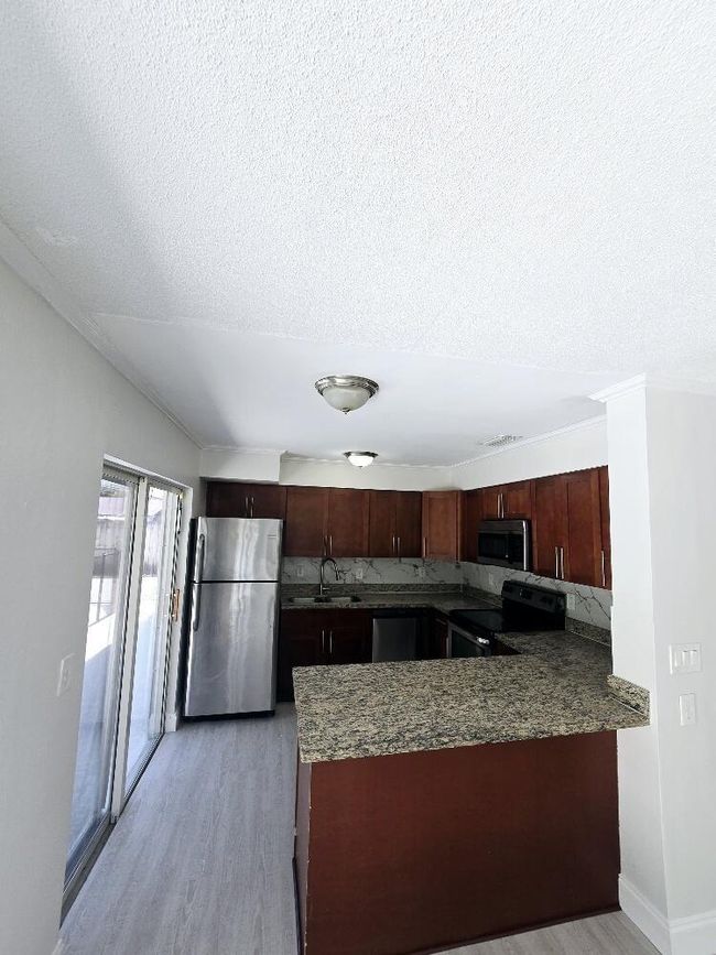 6952 Tradewind Way, House other with 3 bedrooms, 2 bathrooms and null parking in Lake Worth FL | Image 4