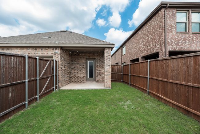 View of yard with a patio | Image 33