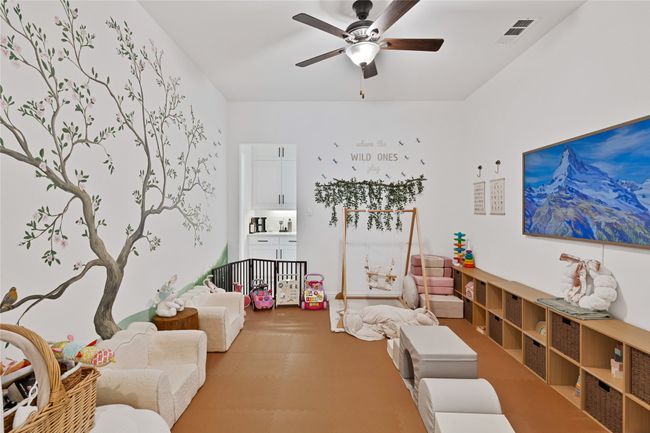 Living room with ceiling fan | Image 8