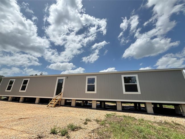 View of front of property, covered deck recently added in the next few pictures | Image 23