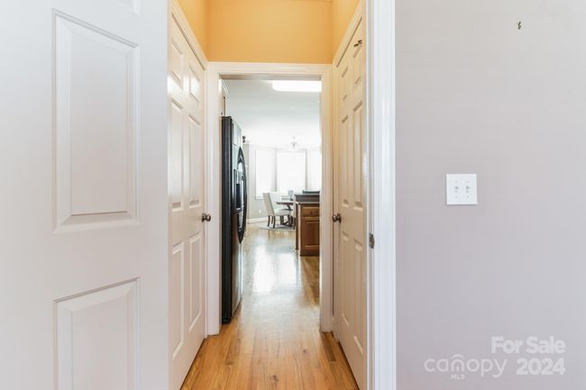 Pantry door (L) Storage door (R) between Dining & Kitchen | Image 13