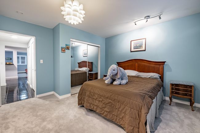 Carpeted bedroom featuring a closet and baseboards | Image 28