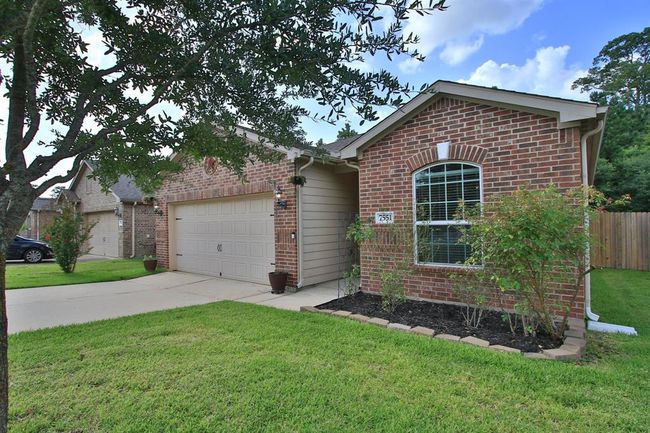 7551 Fettle Ln, House other with 3 bedrooms, 2 bathrooms and 2 parking in Conroe TX | Image 8