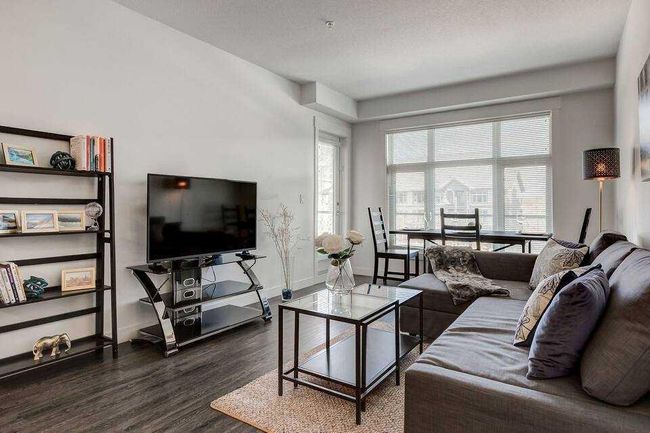 104 - 15 Aspenmont Heights Sw, Home with 2 bedrooms, 2 bathrooms and 1 parking in Calgary AB | Image 2