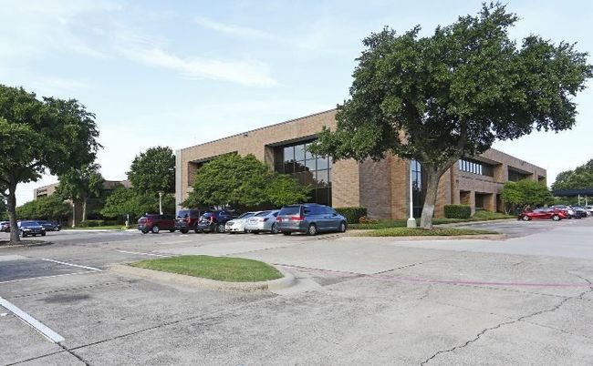 View of building exterior with uncovered parking | Image 6