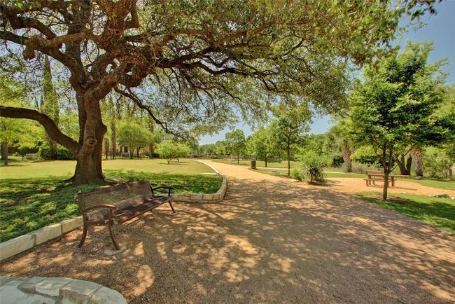 View of home's community with a lawn | Image 28