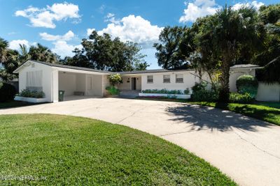 CIRCULAR DRIVEWAY AND 2 CAR GARAGE/CARPORT | Image 1