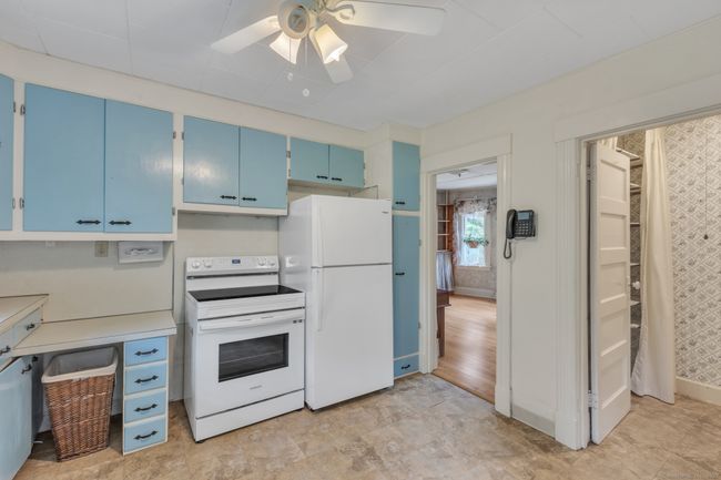 view leading to bath and dining area | Image 10