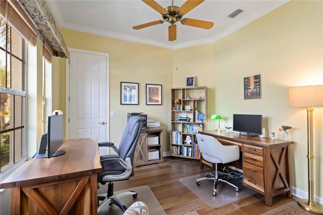 Front den has deep storage closet. | Image 6