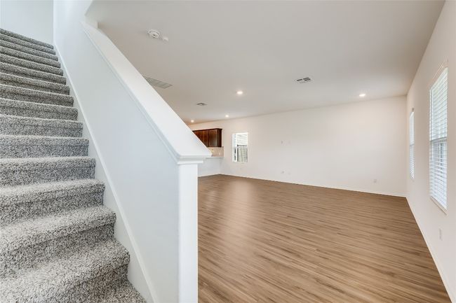 Staircase featuring wood finished floors and recessed lighting | Image 17