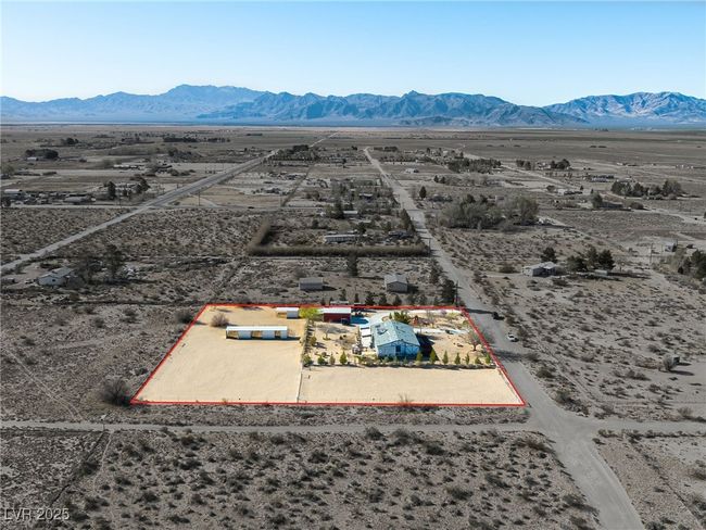 Birds eye view of property with a mountain view, a rural view, and view of desert | Image 71