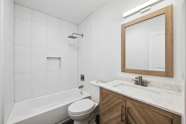 Full bath with vanity and shower / washtub combination | Image 28