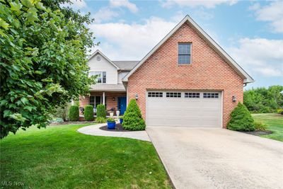 View of front of property featuring a front yard | Image 1