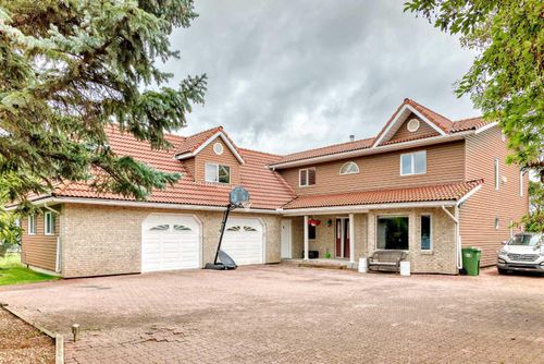 9 Rustic Road, Norglenwold, AB, T4S1S5 | Card Image