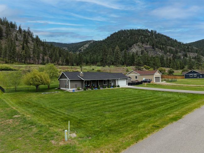 Mountain view featuring a heavily wooded area | Image 32