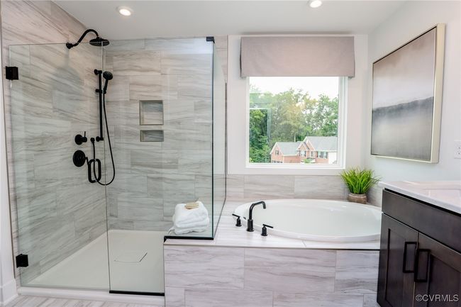 VIRTUAL STAGING. Photo represents the plan with virtual staging. Luxurious primary suite. | Image 22