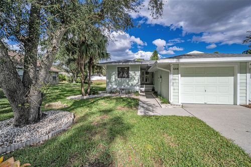 1206 S Pointe Alexis Dr, Tarpon Springs, FL, 34689-7109 | Card Image