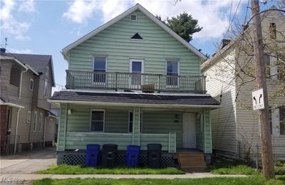 View of front of property featuring a balcony | Image 1