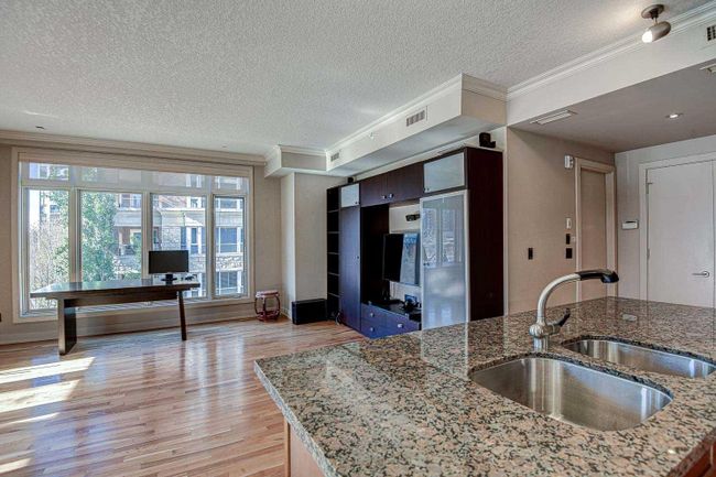 306 - 660 Eau Claire Avenue Sw, Home with 1 bedrooms, 1 bathrooms and 1 parking in Calgary AB | Image 10