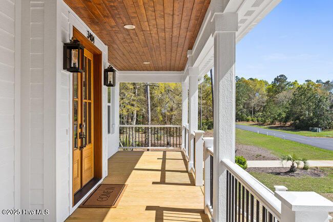 covered front porch with toungue-n-groove detail | Image 73