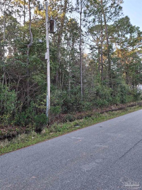 1060 Woodlore Cir, Gulf Breeze, FL, 32563-3138 | Card Image
