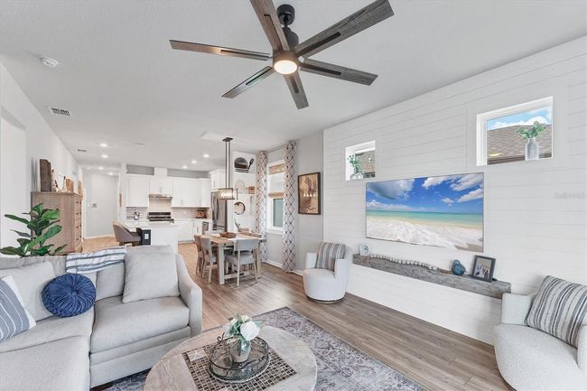 View from Gathering room to Cafe area into kitchen | Image 8