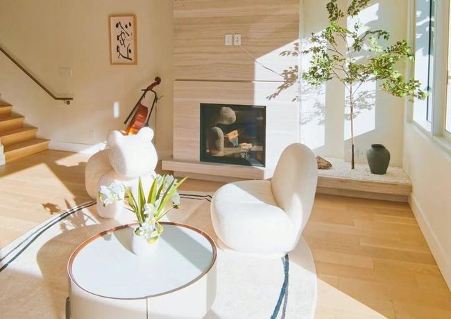 Living area featuring baseboards, wood finished floors, and stairway | Image 6