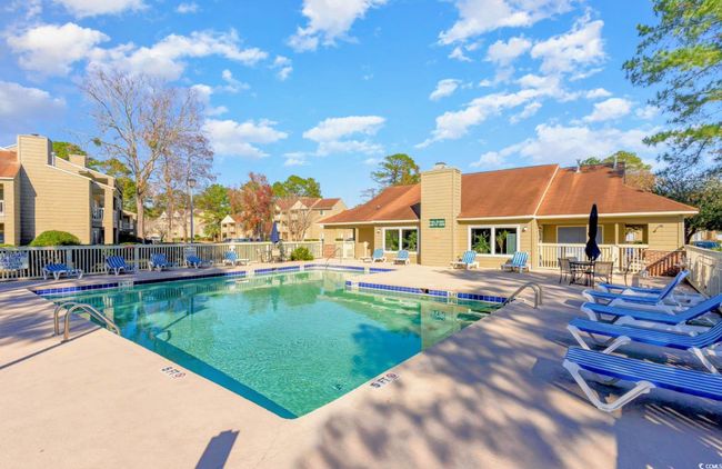View of swimming pool featuring a patio | Image 18