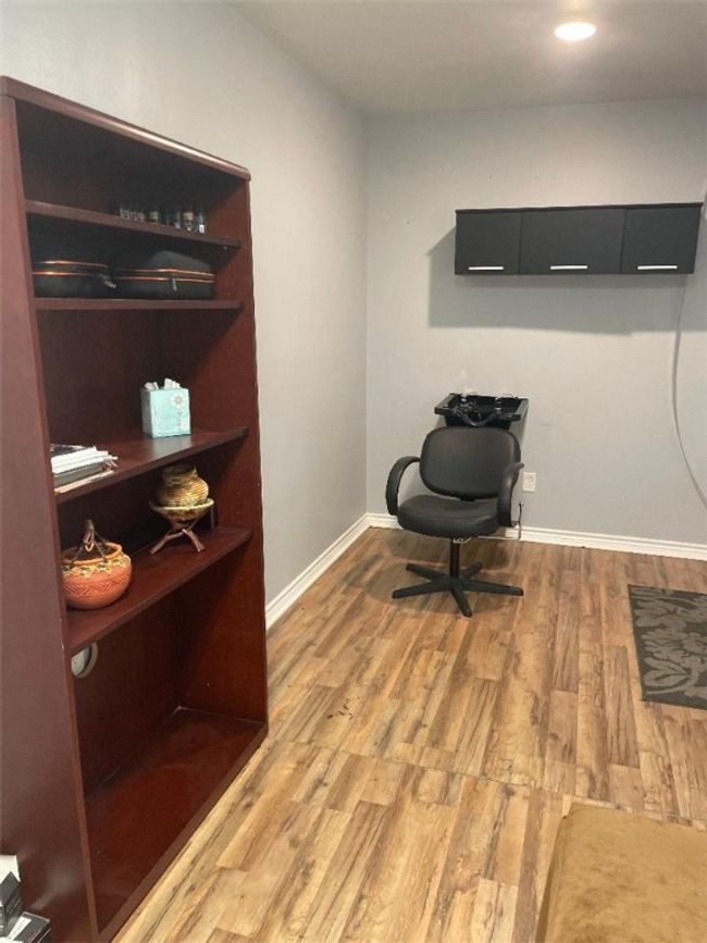 Office area with wood-type flooring | Image 7