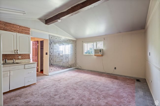2nd Kitchen featuring light carpet, white cabinetry, and light countertops | Image 25