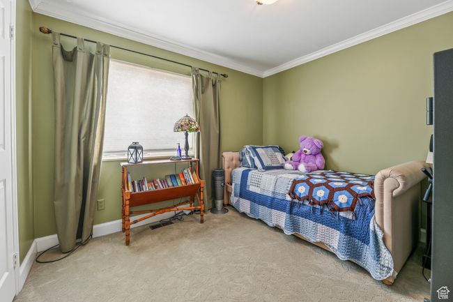 Carpeted bedroom featuring ornamental molding and baseboards | Image 22