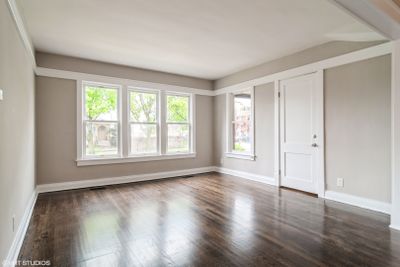 3945 N Olcott Avenue, Home with 5 bedrooms, 2 bathrooms and 2 parking in Chicago IL | Image 2