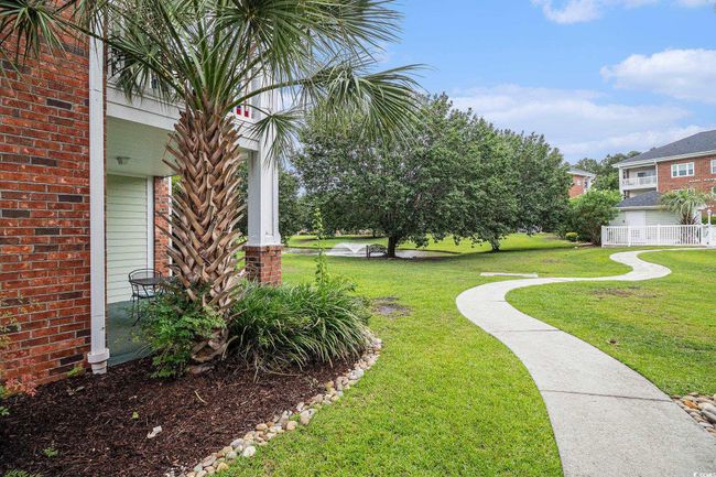 View of yard, overlooking pond | Image 17