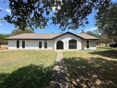 View of front of property featuring a front yard | Image 1