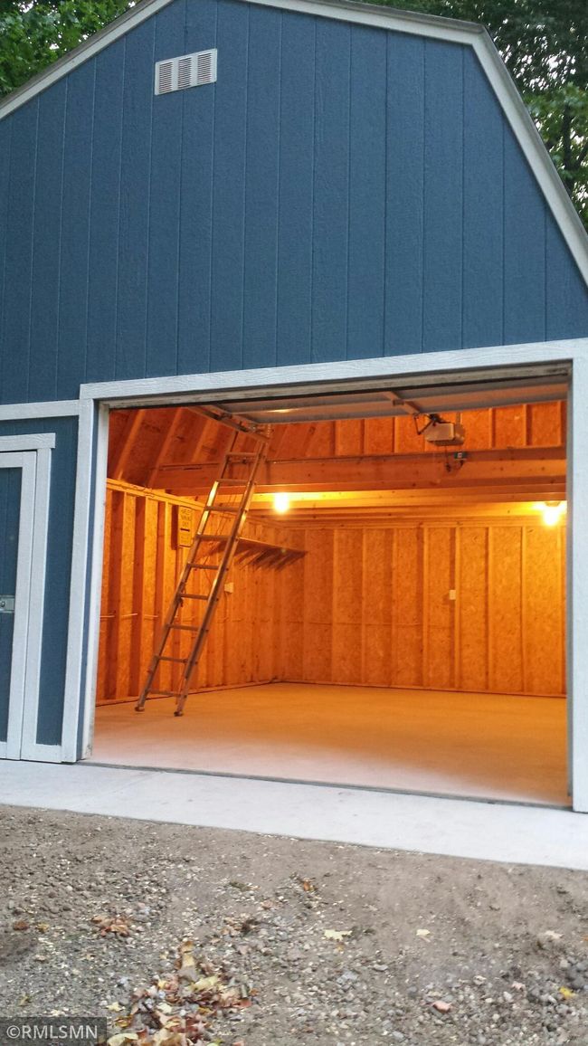 An interior photo of the additional garage shows the loft which will offer an abundance of storage space. | Image 8