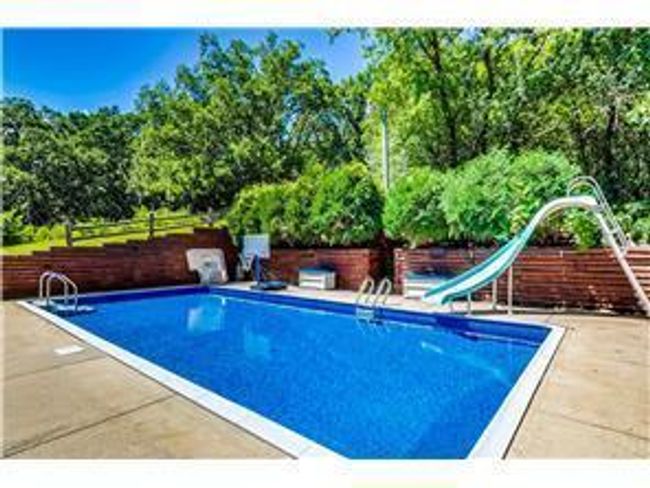 pool slide photo provided by previous owner | Image 38