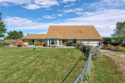 Back of house featuring a patio area and a yard | Image 1