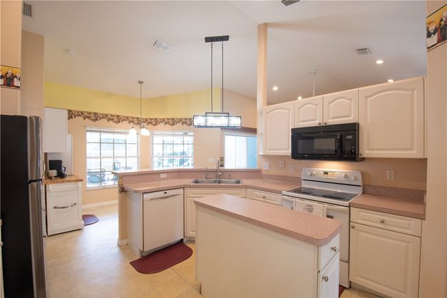 1018 Persian Ln, House other with 4 bedrooms, 2 bathrooms and null parking in Sebastian FL | Image 4