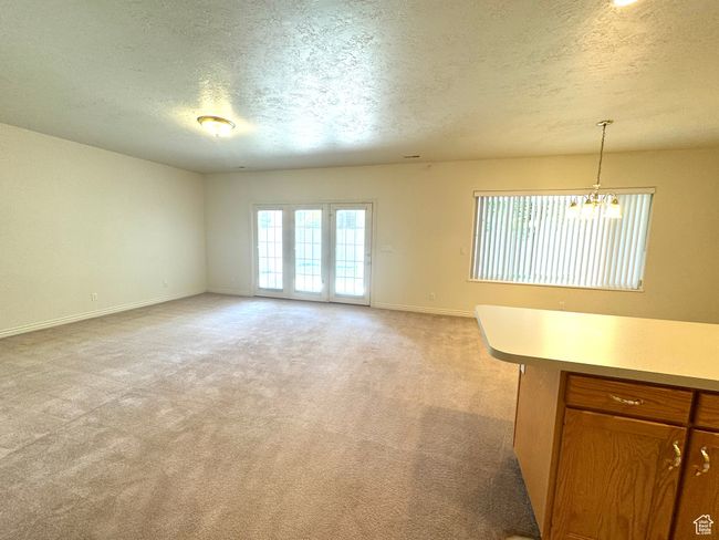 Additional view of basement family room, dining and full kitchen. | Image 26