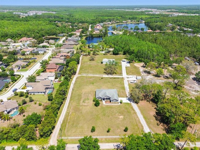 15513 Phillips Rd, House other with 4 bedrooms, 3 bathrooms and null parking in ODESSA FL | Image 75