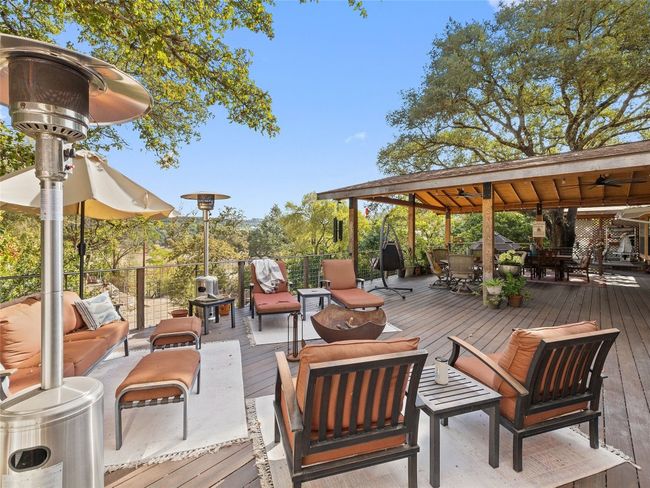 The back patio is approximately 2, 000 square feet and features both covered and open spaces. | Image 8