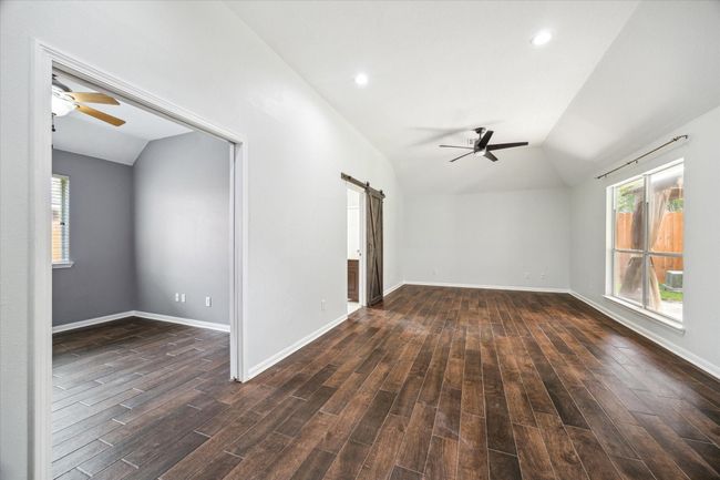 Enormous Primary bedroom with bonus room | Image 16