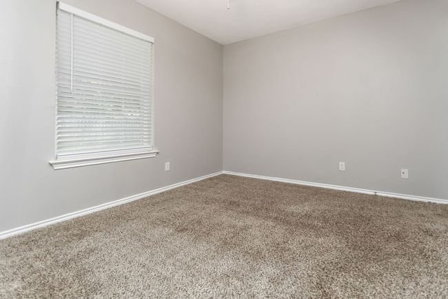 Unfurnished room featuring carpet flooring and baseboards | Image 14
