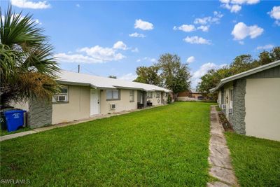 View of yard with cooling unit | Image 2