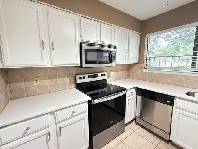 View of one side of the kitchen area | Image 15