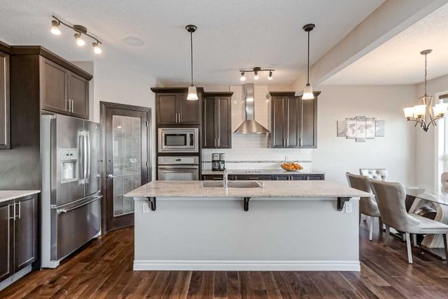 168 Cougar Ridge Manor Sw, Home with 4 bedrooms, 3 bathrooms and 4 parking in Calgary AB | Image 5