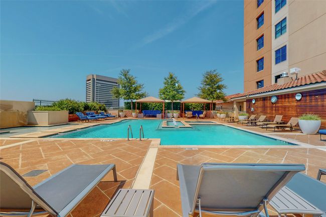 Community pool featuring a patio area | Image 38