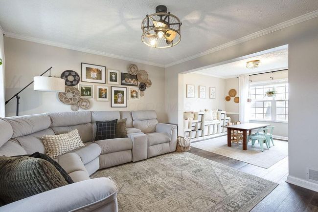 Formal Living room open to dining room. | Image 12